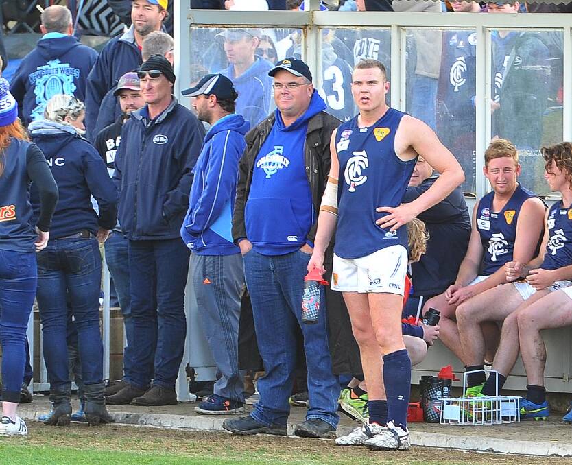 ANOTHER CHANCE: Coleambally footballer Josh Hamilton (right) watches the 2016 Farrer League grand final from the bench. He can apply to be re-registered in 2019. Picture: Kieren L Tilly