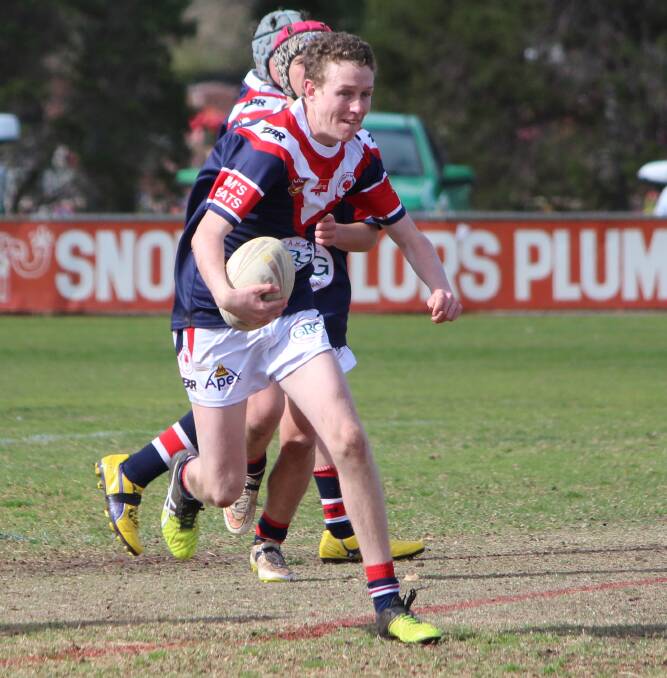 CHARGE: DPC's Todd Gaffey brings a ball back against the Waratahs in the under 16s on Saturday at the Exies Oval.