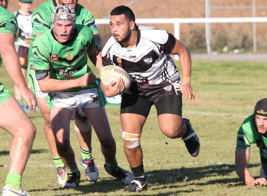 SURGING RUN: Clint Lilo finds some space against the Leeton Greens last weekend. Picture: Ron Arel