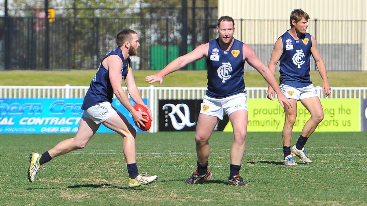 Todd Clark tries to get the Blues rolling forward off the half-back line. Pictures: Kieren L Tilly