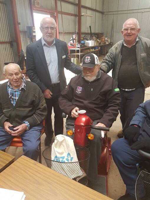 SHED: Council GM Craig Moffitt enjoys coffee time at Jerilderie Men’s Shed with president Bill Ferris and members Harry Sleeman and Tony Herrick.