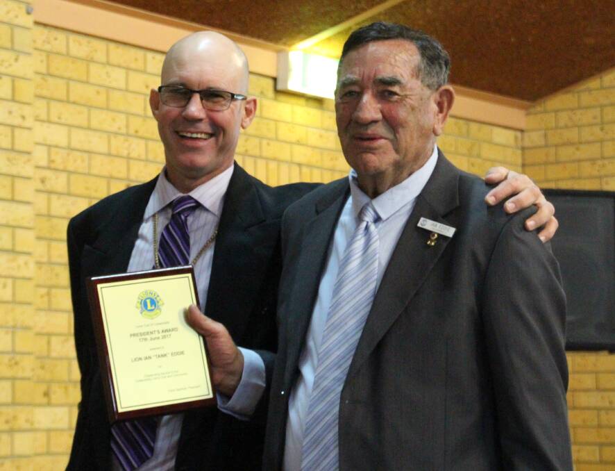 WELL DESERVED: Coleambally Lions volunteer Ian Eddie was a popular recipient of a President’s Award from outgoing head Trent Gardiner recently.