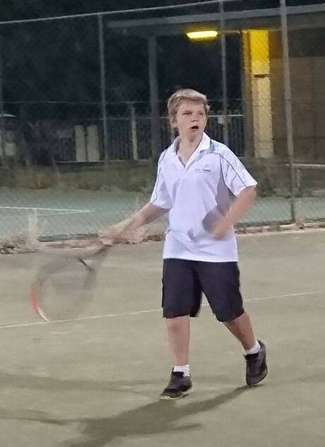 Daniel Collier in summer tennis competition at Coleambally.