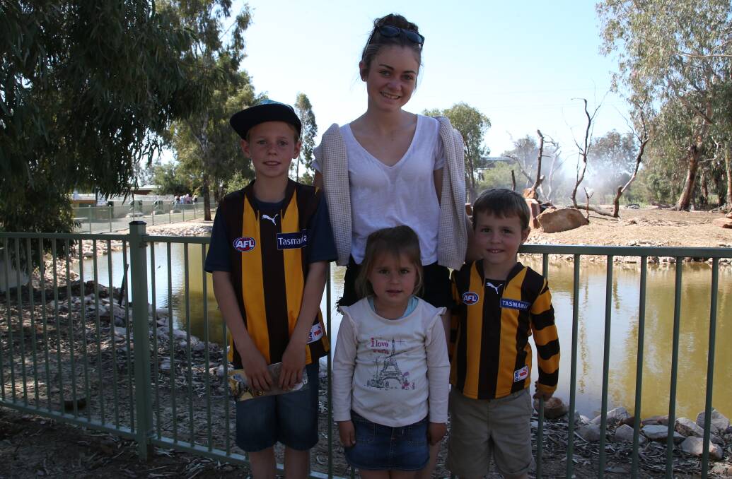 Hunter, 9, Olivia, 16, River, 5 and Willow Purcell, 3 wearing their colours.