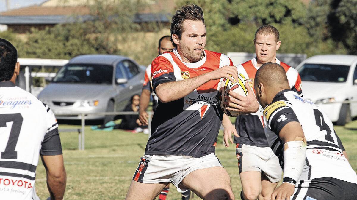 Darlington Point-Coleambally Roosters player-coach Andrew Herbert, pictured here taking the ball up last season, is confident his side can give the Group 20 a shake this season.
