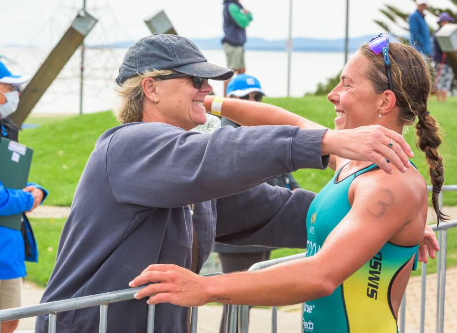 SPECIAL REUNION: Sue and Emma Jeffcoat celebrate after Emma's dominant victory in the Devonport Triathlon. Picture: Simon Sturzaker