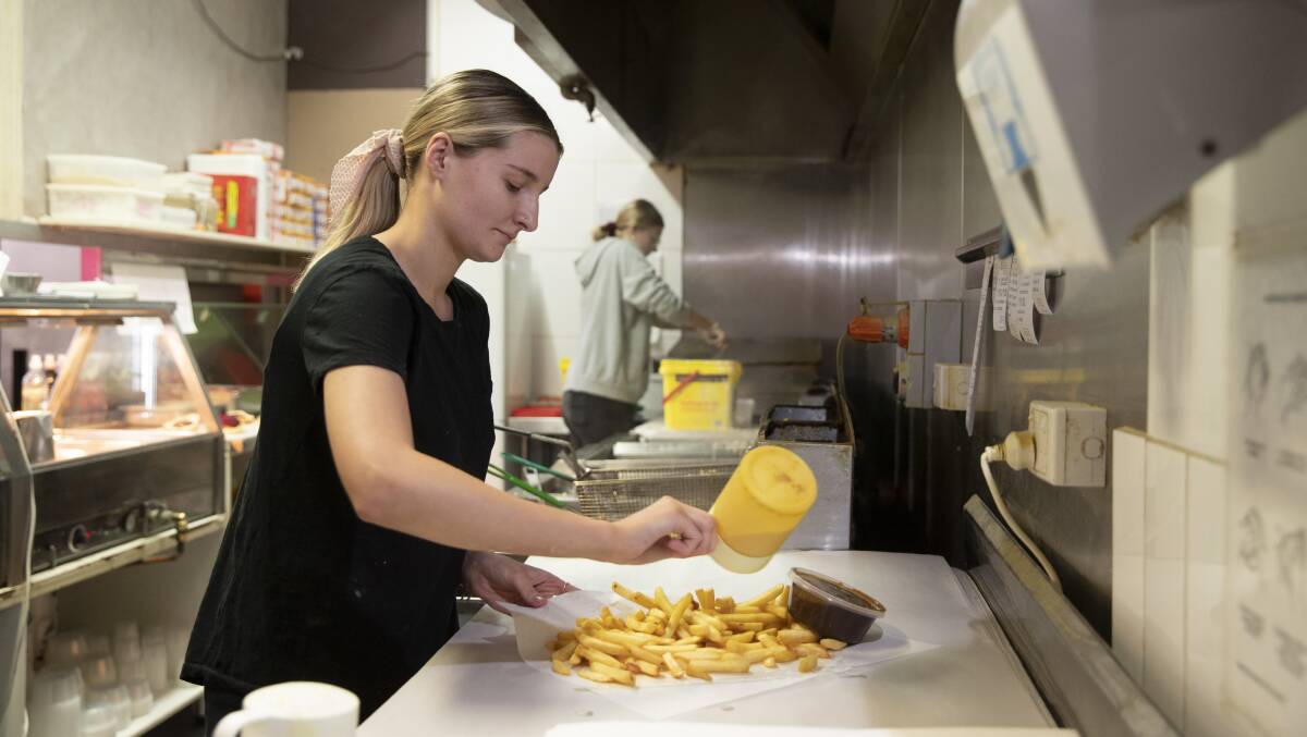CRAZY: Manager at Southcity Takeaway Lana Minchin has seen "crazy" rises in the price of oil and potatoes this year, leading to more expensive chips. Picture: Madeline Begley 