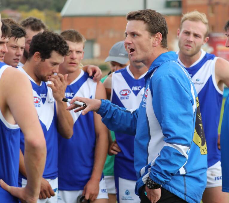 LAYING DOWN THE LAW: Farrer League coach Ryan Forsyth addresses his players at quarter time on Saturday. Picture: Les Smith