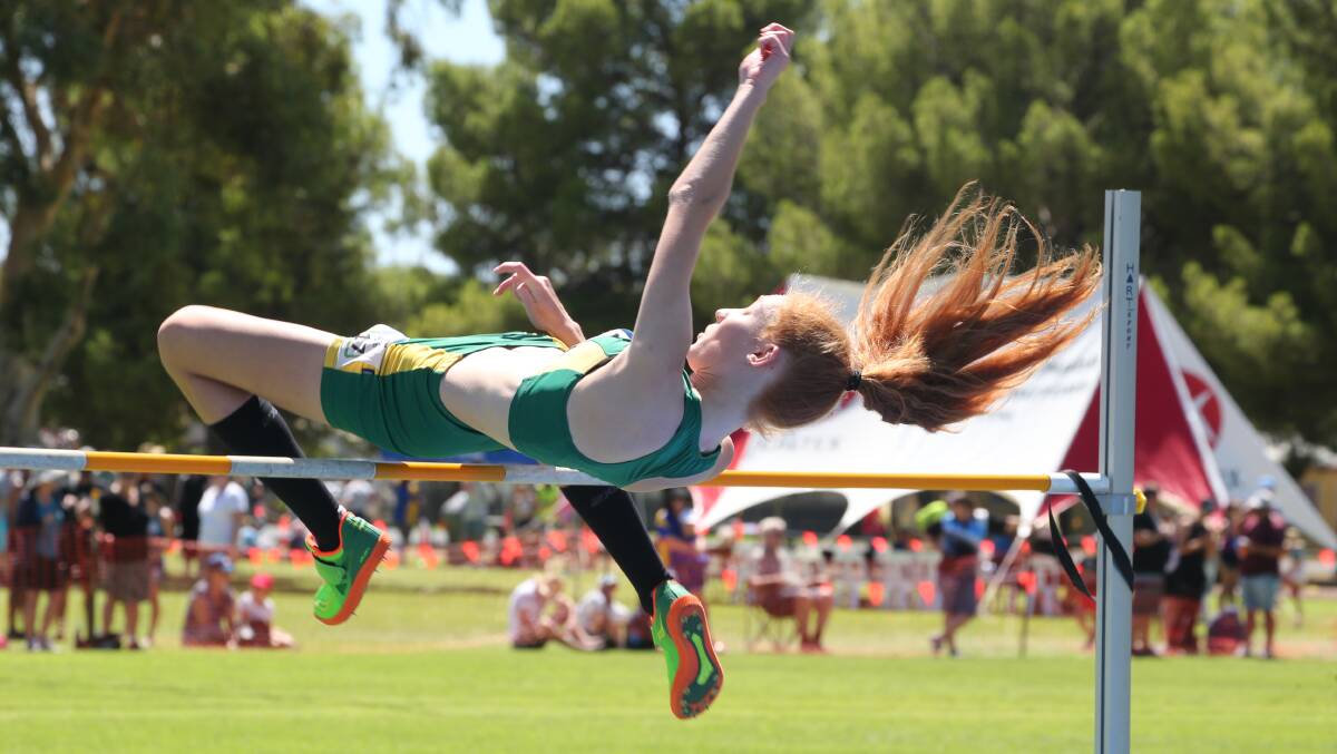 Flying over the competition at the Little Athletics Carnival Griffith 