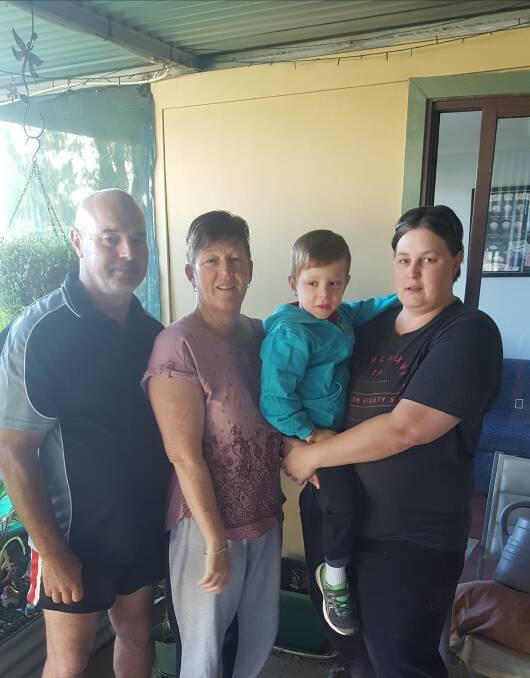 West Wylong family: Wayne Schmidt, Roz Schmidt, Iszac Miller-Schmidt and Tegan Schmidt are extremely grateful for the generosity shown to them by members of the Coleambally community. PHOTO: contributed 