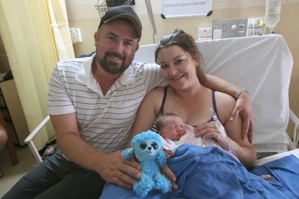 FIRST OUT: Proud parents Paul Rook and Candice Hunter with little baby Rook, the first child born at the base for 2019. Picture: Anthony Stipo