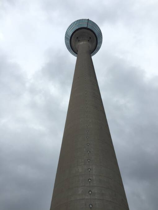 UP: The exterior of the Rheinturm which offers spectacular views at the top. 