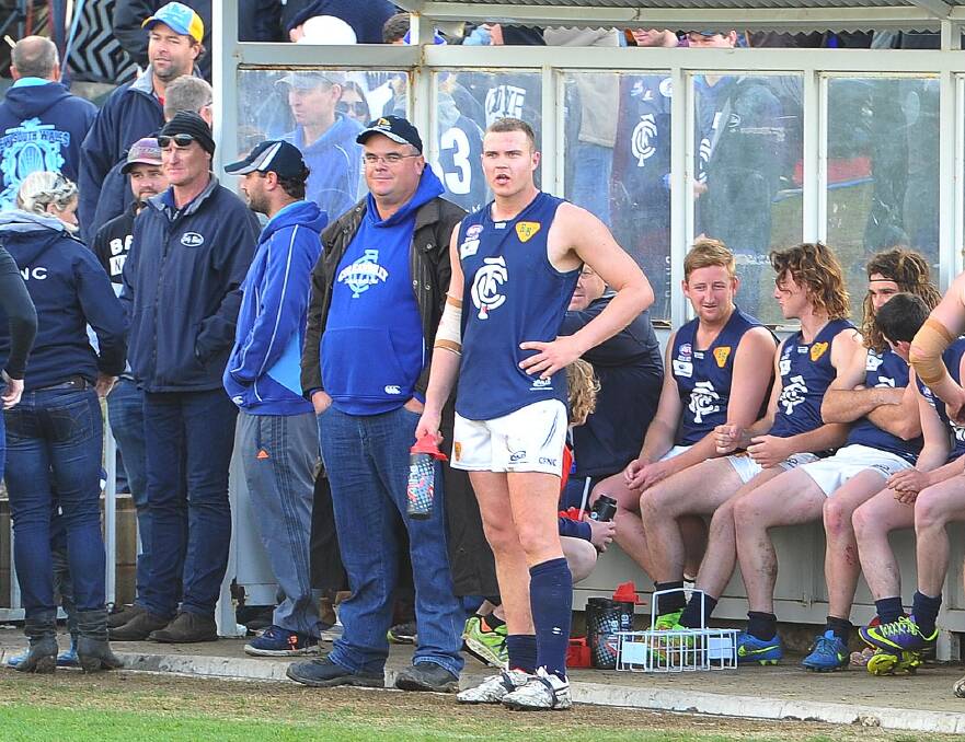 Then-Coleambally coach Josh Hamilton off the ground during the 2016 grand final. 