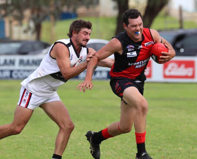 TOP FORM: North Wagga's Cayden Winter chases down Marrar's Brad Moye. Winter is leading the Player of the Year voting at the halfway mark. Picture: Les Smith