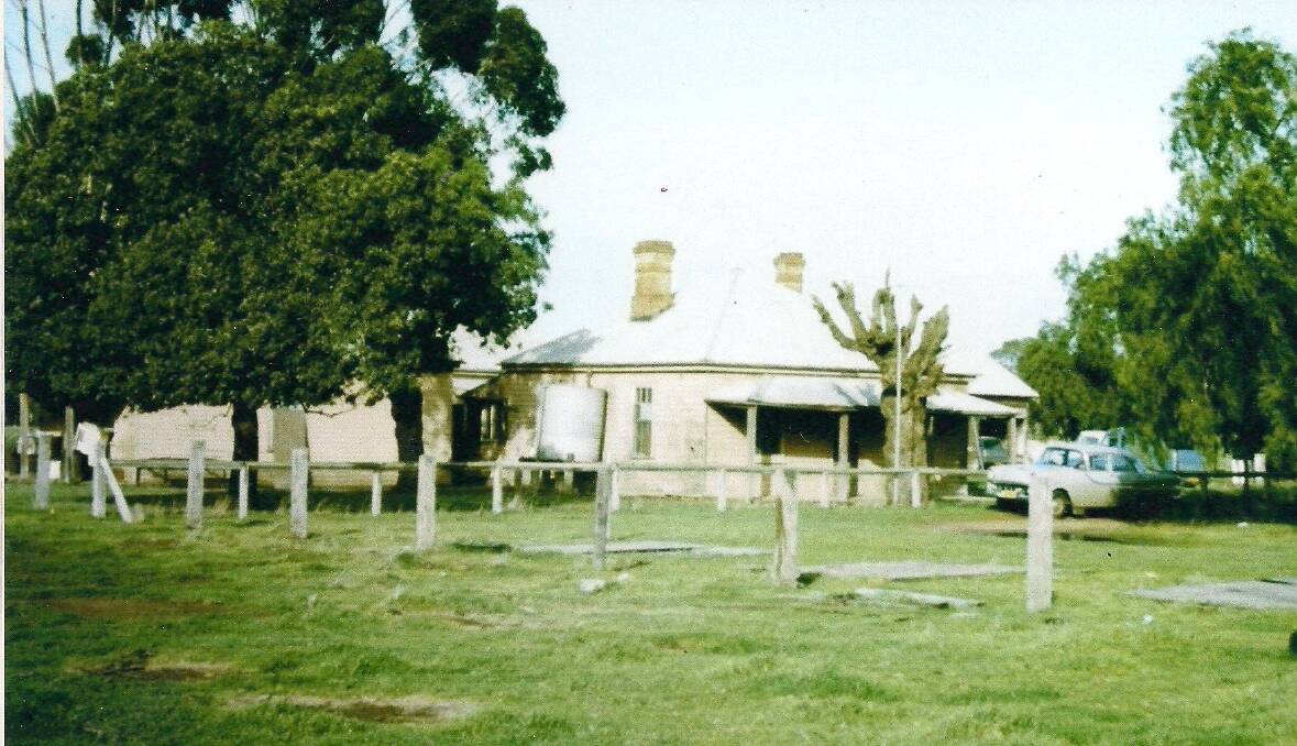 HISTORY: The old police station at Darlington Point in 1964. The main building is the police residence, and the courthouse can be glimpsed on the left. Picture: John Love
