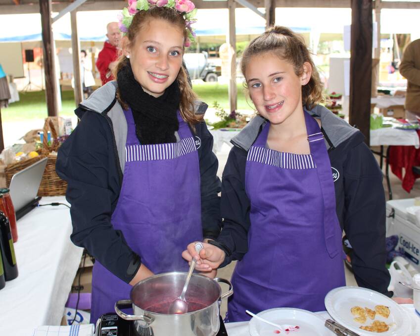 FLASHBACK: Sisters Jacinta Burgess, 15, and Natalia Burgess, 12 were making waffles at the Taste Coleambally Food and Farm Festival back in 2014.