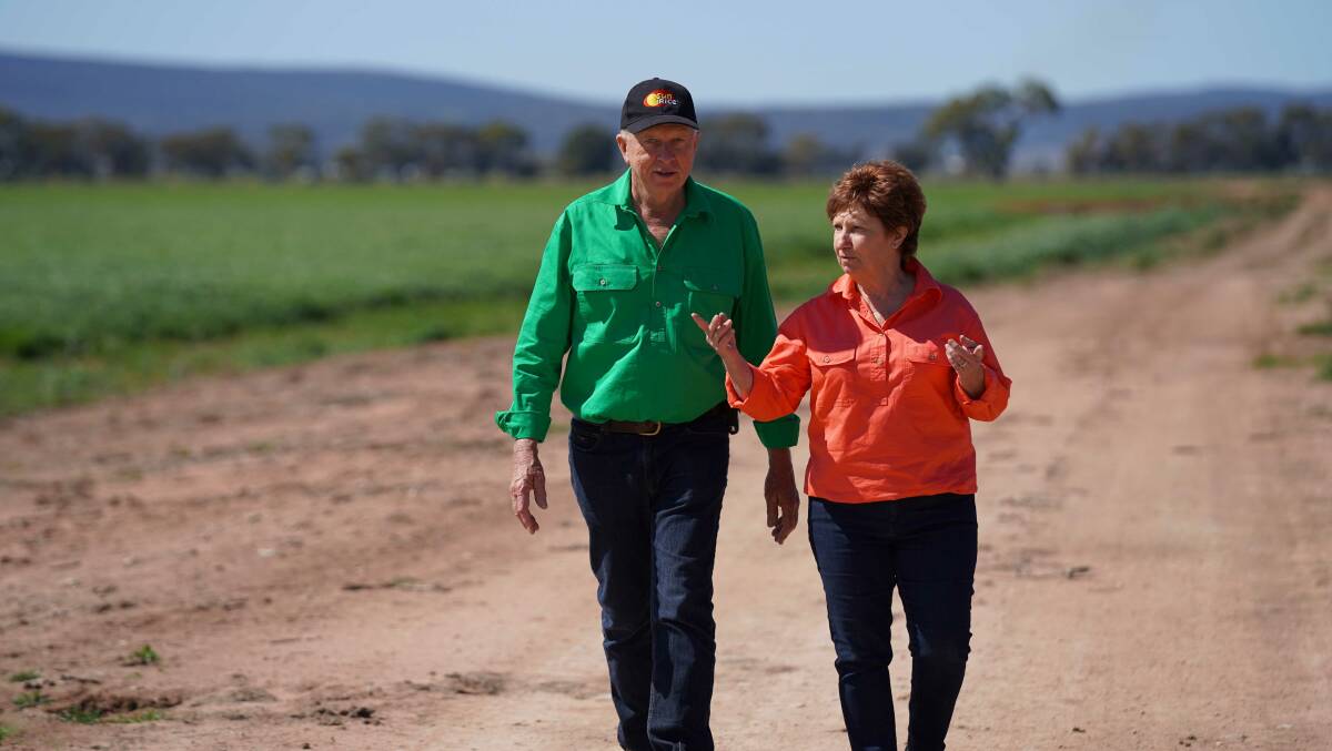 DISCUSS: Leeton's SunRice Growers of the Year Peter and Erin Draper on their property. Photo: Supplied