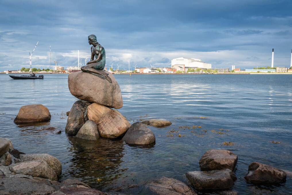 The Little Mermaid in Copenhagen. Not pictured: a crowd of people gathered around to photograph the statue. Picture: Shutterstock