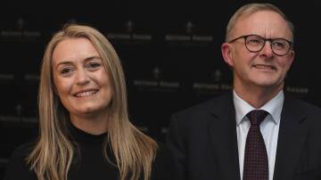 Anthony Albanese is yet to confirm if his partner Jodie Haydon (left) will move with him into the prime minister's official residence. Picture AAP