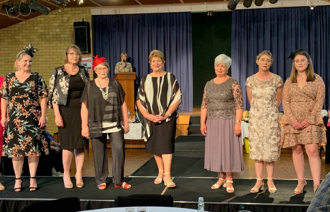 FASHION ON SHOW: Cate Hardy, Karen Bull, Sue Inglis, Helen Kelly, Judy Duffell, Monika Burgess and Natalia Burgess showcase some of the latest trends at the Coleambally Can Assist fashion parade. PHOTO: Contributed