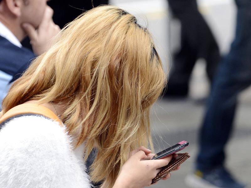Phone scrolling is causing "tech neck", with one in three experiencing pain in the past year.