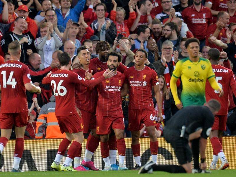 Mohamed Salah (centre) has helped Liverpool to a winning start against Norwich in the EPL.