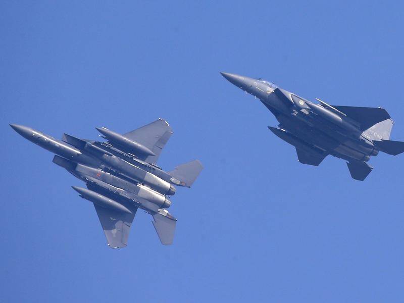 F-15K fighter jets like these were scrambled when a Russian plane entered South Korean air space.