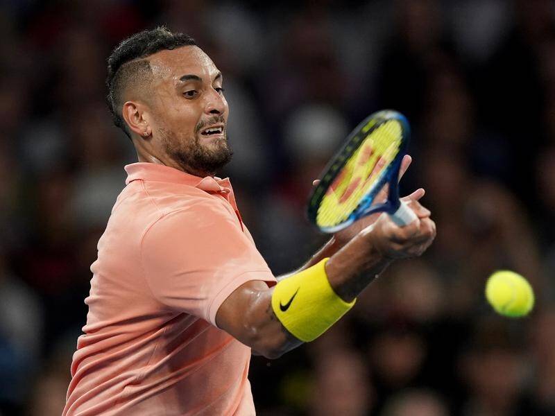 Nick Kyrgios is through to the third round of the Australian Open after beating Gilles Simon.
