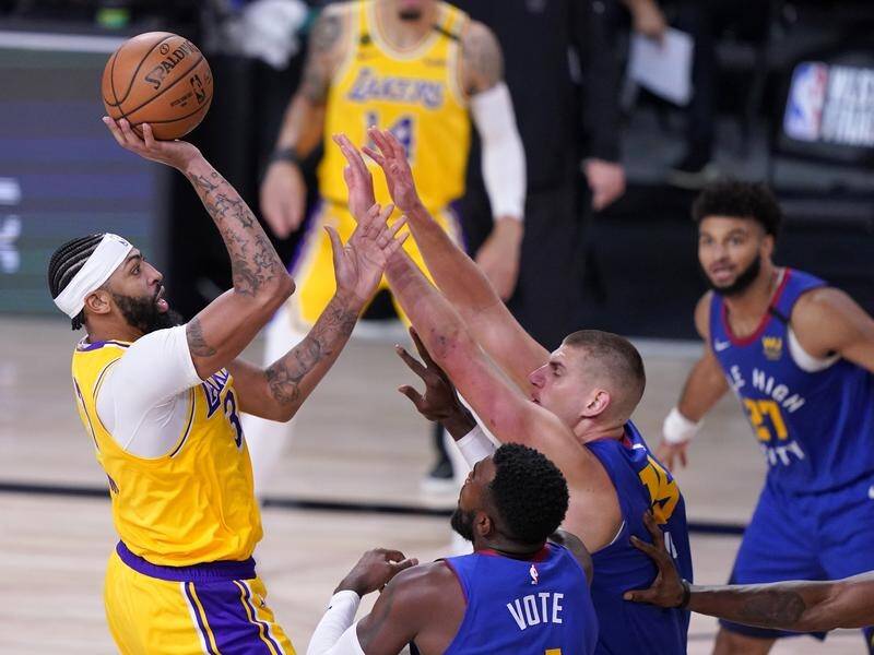 Anthony Davis was the dominant player as the Los Angeles Lakers overwhelmed the Denver Nuggets.