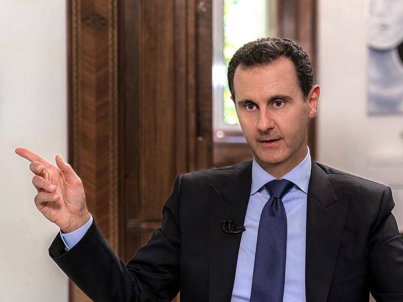 Syrian President Bashar al-Assad has warned unnamed groups: "The Americans will not protect you."