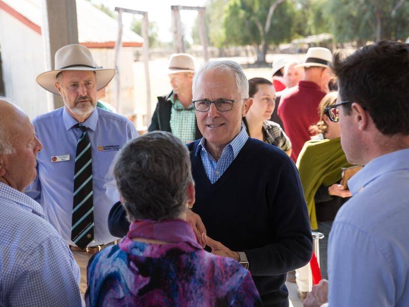 Prime Minister Malcolm Turnbull is urging farmers to apply for drought aid.