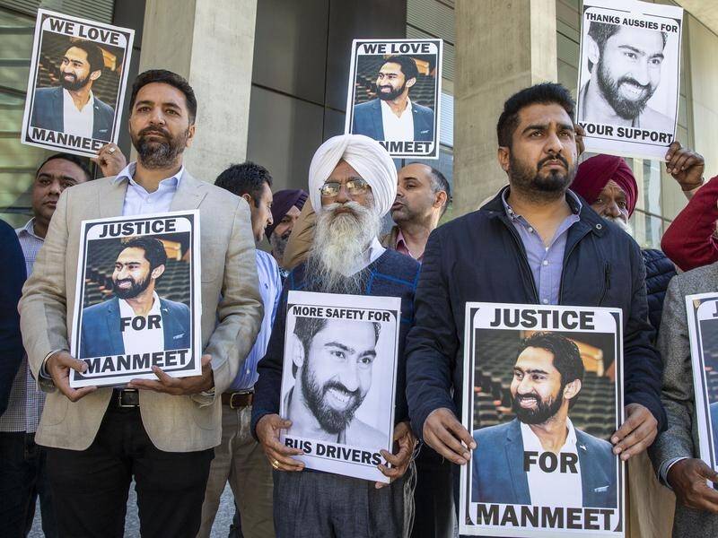 Manmeet Alisher's father (centre) says his son's killer should never be allowed to walk free.