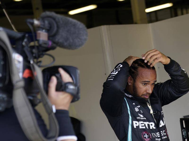 Lewis Hamilton is on pole position for the British GP after a record-breaking lap.
