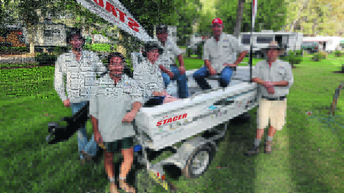ON THE WATER: Darlington Point Riverina Classic Fishing Competition organisers Chris Sutton, Shaun Roche, Ben Witham, Josh Verlin, Ben James and Daren Gill put the finishing touches to the staging of the inaugural event. 