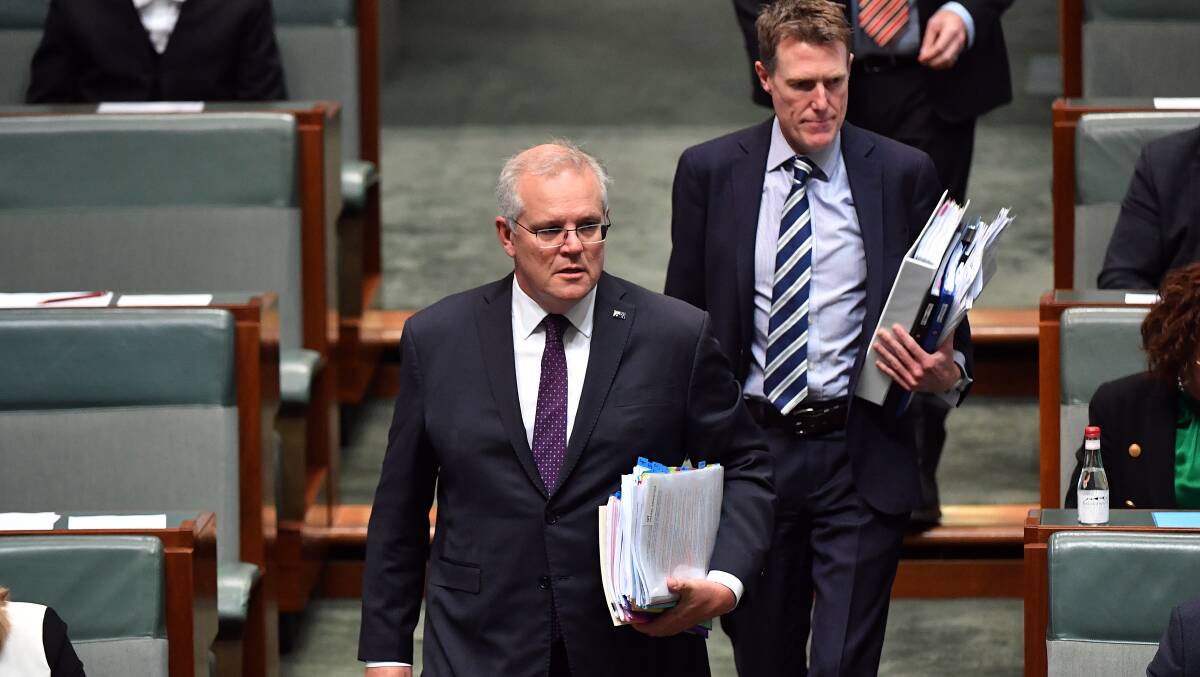 Prime Minister Scott Morrison (left) has asked for departmental advice on whether former attorney-general Christian Porter (right) has breached ministerial standards in accepting anonymous funds to help fight his legal battle. Picture: Getty Images
