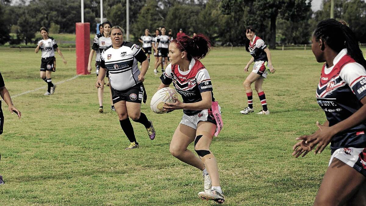LYNCHPIN: DPC League Tag star Candace Vearing makes a dash for the line during the weekend’s draw with the Black and Whites. Vearing has helped lift her side to a realistic tilt at finals footy.