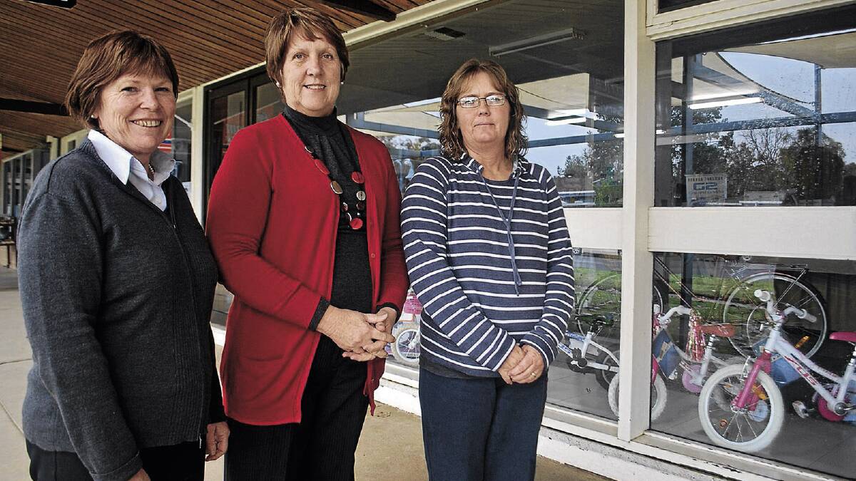 CBD DILEMMA: Supporting a push to have the Brolga Place CBD precinct overhauled are (from left) Councillor Christine Chirgwin, Coly Chamber of Commerce president Lyn Stuckings  and Jodie Gilbert from Coleambally Electrical.